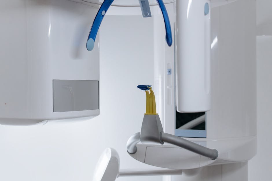 Close-up of modern dental x-ray equipment in a clinic displaying advanced odontology technology.
